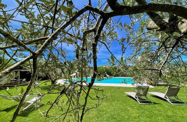 Centrally located villa in lush grounds and gardens with exclusive pool.