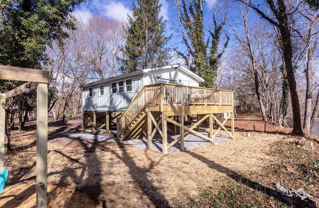 Riverfront with 2 homes featuring 7 bedrooms Outdoor Pavilion 2 Hot Tubs Fire Pit and Pool