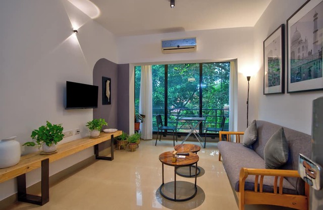 Chic 1BHK Vagator, French Windows in both living room and bedroom.