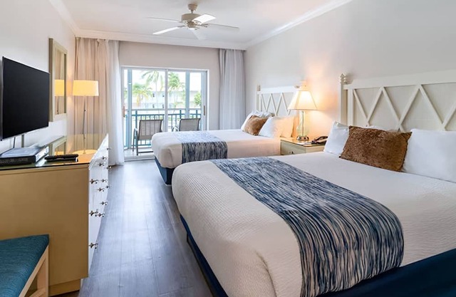 Spacious Poolside Unit w/Balcony | Free Parking | Outdoor Swimming Pool