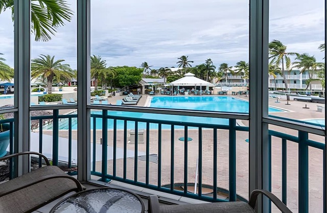 Island Getaway! Pool View Unit | Balcony | Ideal for Families! Free Parking
