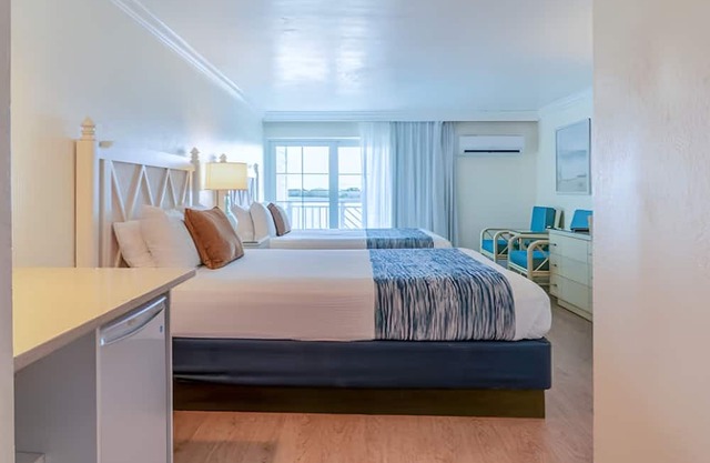 Family-Friendly Comfort! Bay View Unit w/Balcony | Outdoor Pool | Free Parking