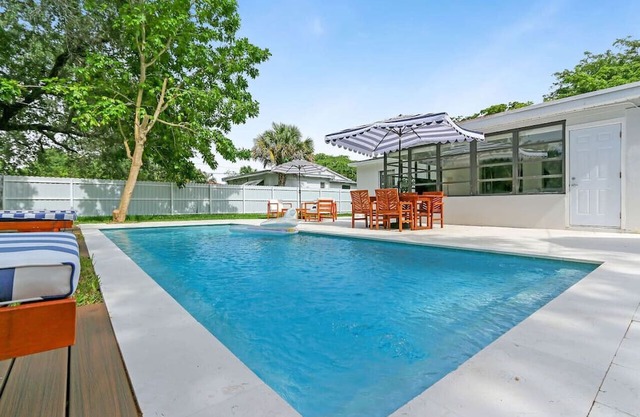 Charming 4BR Oasis with Saltwater Pool & Parking