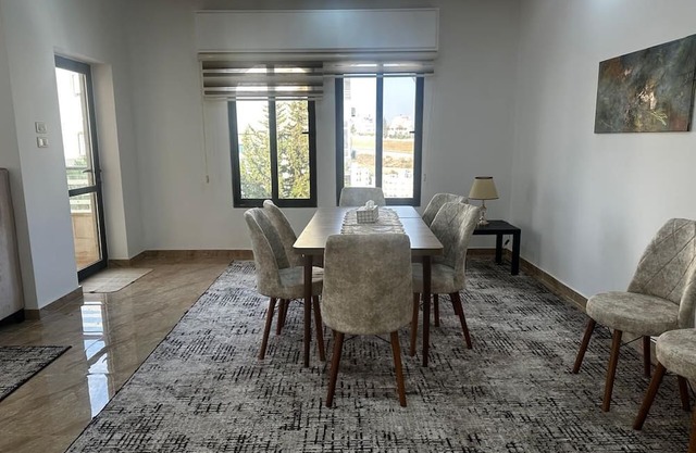 (5) 3-bedroom quiet apartment with free parking, balcony & sitting areas.