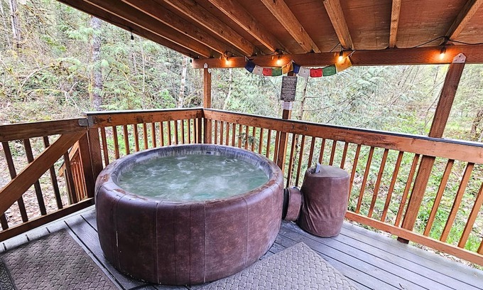 Mount Hood Village House | Comfortable Dog-Friendly Home with hot tub, fire pit, deck and large front yard.