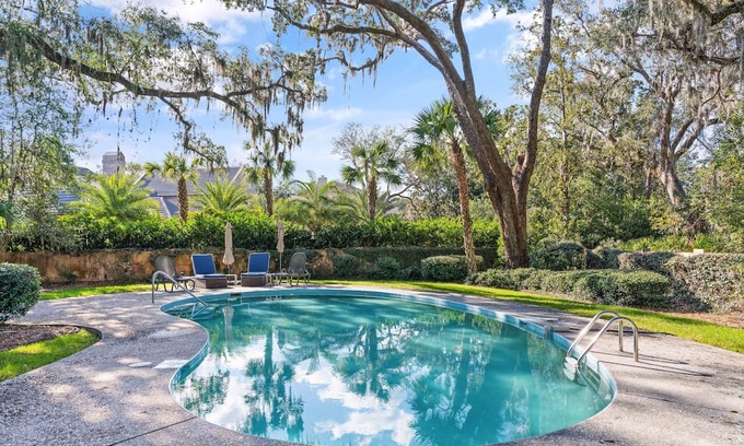 Sea Island House | Iconic Sea Island "Pink House", 4 King Bedrooms, with a Heated Pool