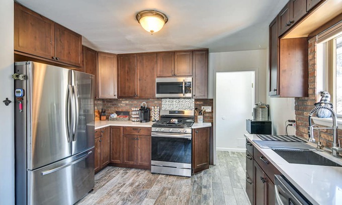Pine Cabin | Riverfront Pine Cabin w/ Hot Tub & Mountain Views!