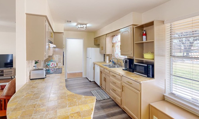 Denton House | Spacious home with front/back yards & great location near downtown