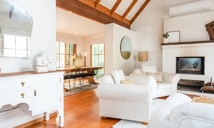 Cape Schanck House | Rosemary Cottage - you'll be greeted by a sprawling lawn and a canopy of mature trees.