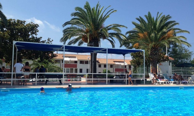 Falerna Apartment | Holiday Apartment "Villa Patrizia - Residence La Giungla" with Sea View, Shared Pool & Wi-Fi
