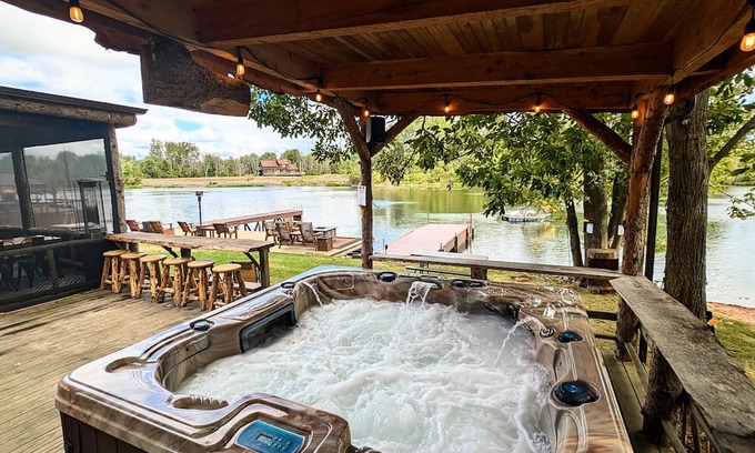 Pennellville Cabin | Entire Cabin Complex, Hot Tub, Movie Theater, 3 Private Docks