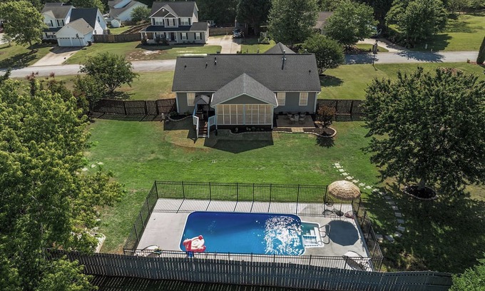 Greer House | Luxury Getaway with huge, fully fenced yard, Pool & Porch in Greer SC