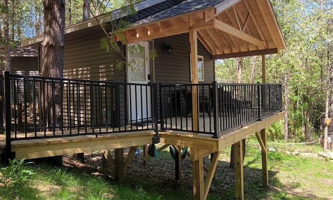 Elba House | Rustic Tree House with Woodland Valley Views in Elba, Minnesota