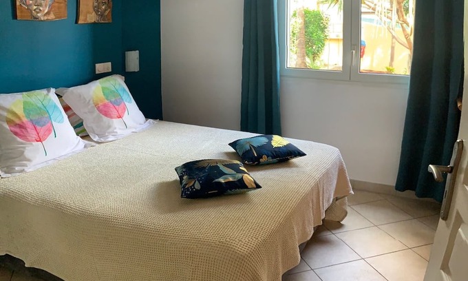 Piton Saint-Leu Apartment | Appartement le Fanjan, T3 de 80m² avec terrasse de 30m² vue jardin et piscine