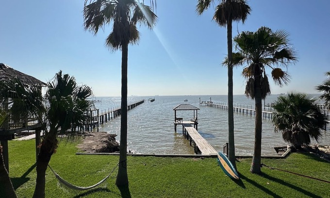 Dickinson House | Charming 2-bedroom house with hot tub and dock right on the San Leon bay