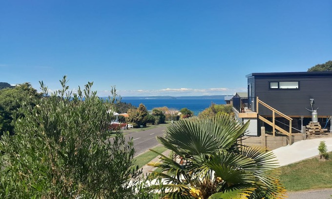 Pokura Pa House | The 8 Point Inn , water views quiet pet friendly cottage